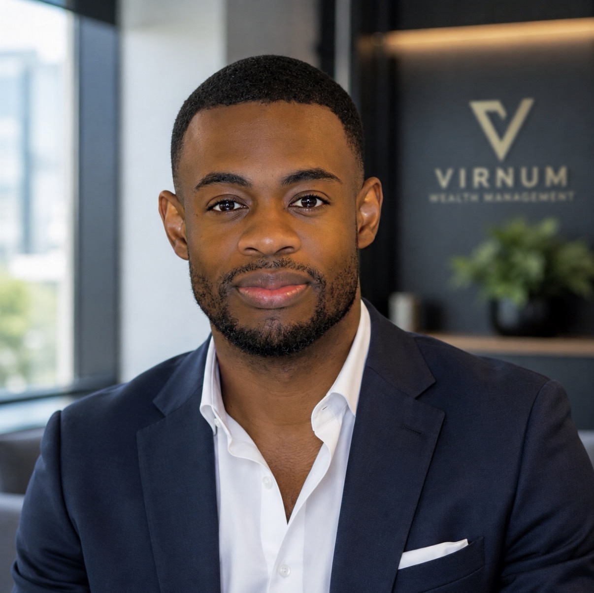 Virnum’s adviser in a navy suit at the Virnum Wealth Management office
